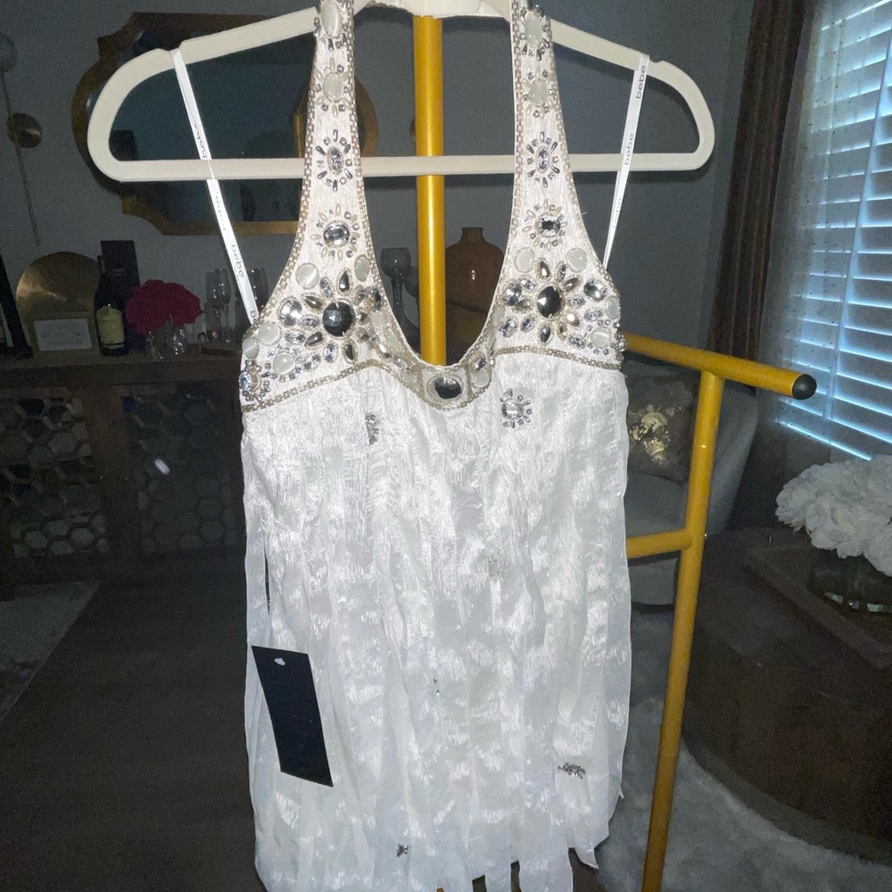 Womens Bebe brand white bejeweled mini dress.